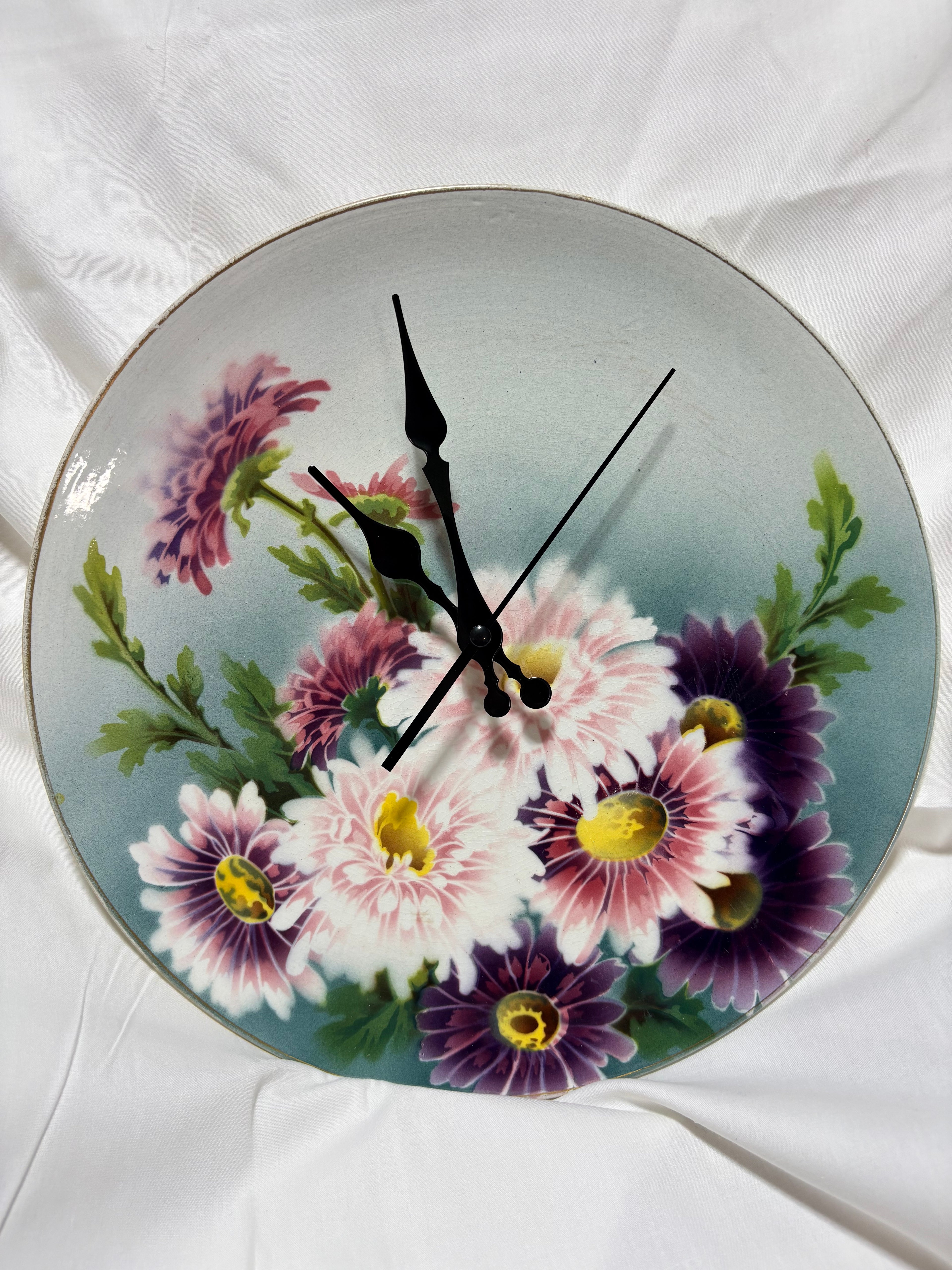 Gorgeous vintage 12” flower plate clocks